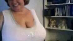 Mature Nancy playing with her boobs on webcam