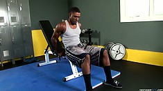 Black stud works out his buff muscles at the gym then takes a break